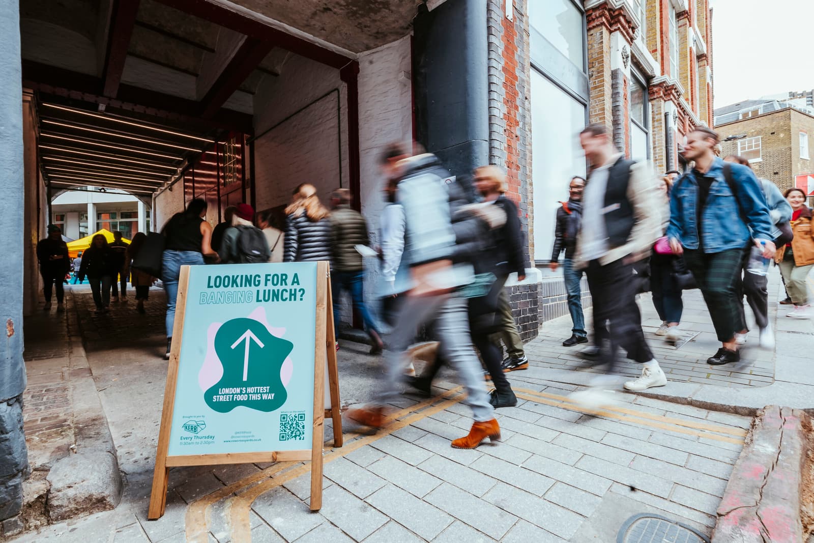 A rush of hungry lunchers heading into Cowcross Yards